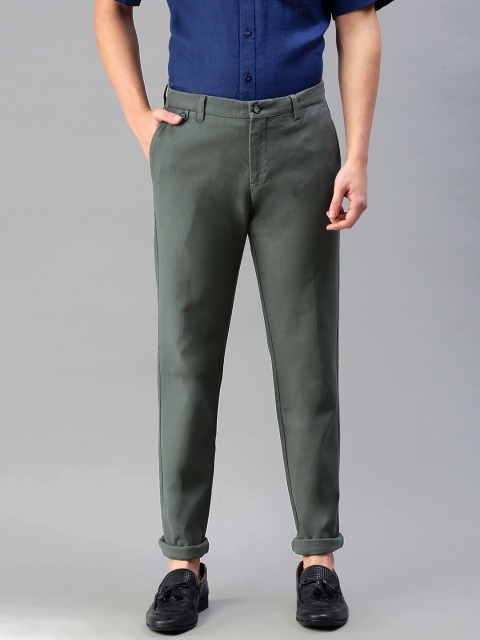 

Tommy Hilfiger Men Grey Textured Slim Fit Regular Trousers