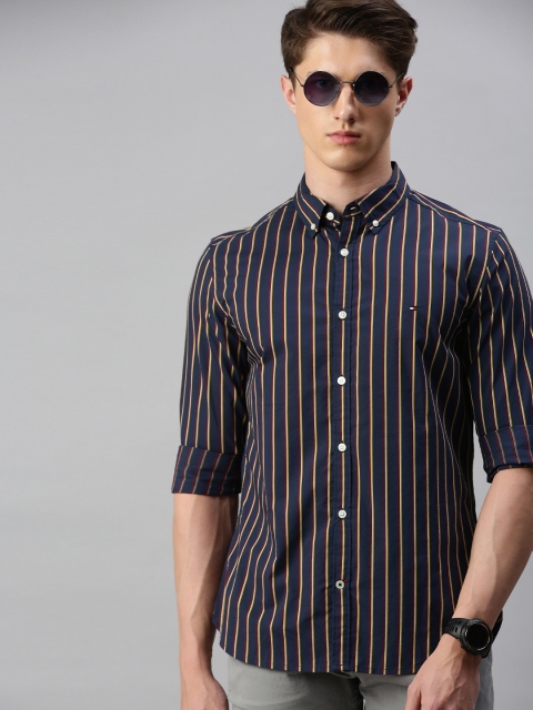 

Tommy Hilfiger Men Navy Blue & Maroon Slim Fit Striped Casual Shirt