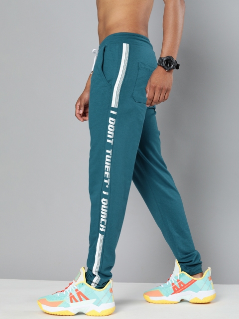 

Kook N Keech Disney Men Teal Blue Solid Track Pants with Side Print Detailing