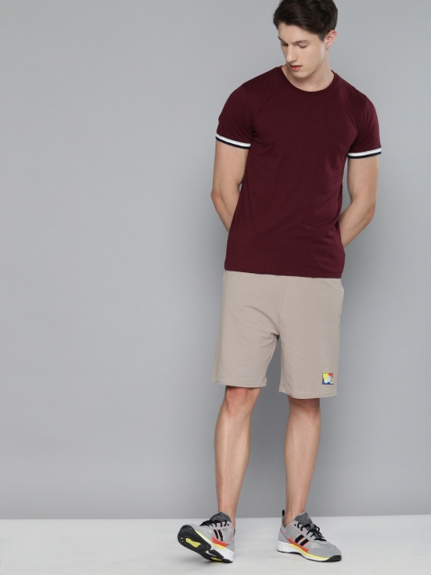 

HRX By Hrithik Roshan Men Wet Weather Solid Drop Crotch Fit Mid-Rise Bio-Wash Gold Finish Lifestyle Shorts, Beige
