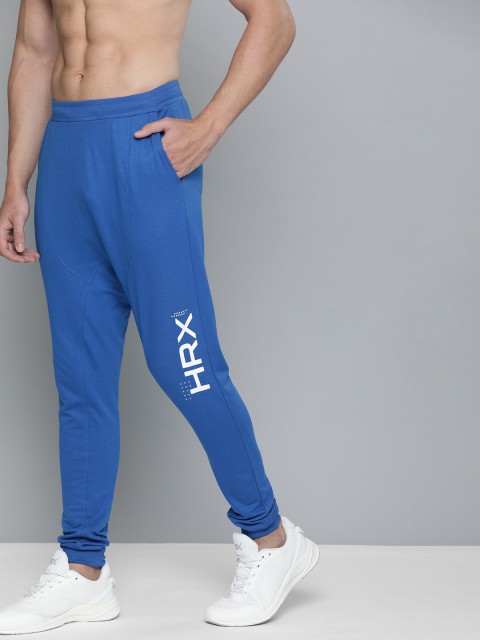 

HRX By Hrithik Roshan Men Strong Blue Solid Drop Crotch Fit Mid-Rise Bio-Wash Lifestyle Joggers