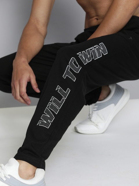 

HRX By Hrithik Roshan Men Jet Black Typographic Regular Fit Mid-Rise Bio-Wash Lifestyle Track Pants