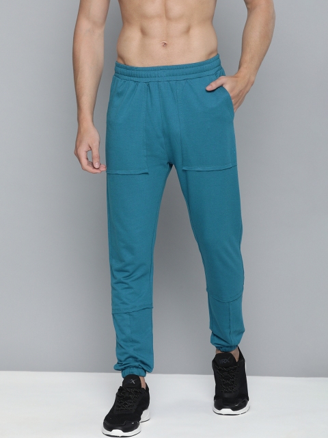 

HRX By Hrithik Roshan Men Blue Sapphire Solid Slim Fit Mid-Rise Bio-Wash Lifestyle Joggers
