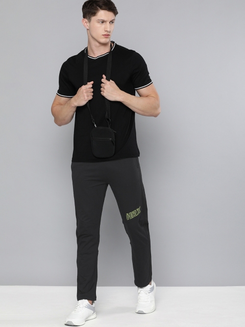 

HRX By Hrithik Roshan Men Jet Black Solid Slim Fit Bio-Wash Lifestyle Track Pants