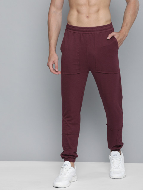 

HRX By Hrithik Roshan Men Fig Solid Slim Fit Mid-Rise Bio-Wash Lifestyle Joggers, Maroon