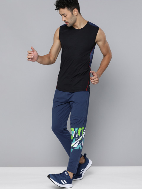 

HRX By Hrithik Roshan Men Medival Blue Solid Slim Fit Lycra Bio-Wash Gold Finish Lifestyle Track Pants