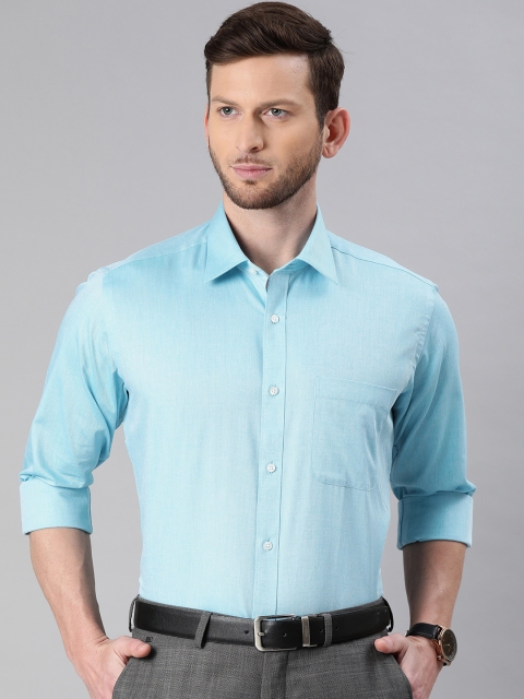 

Raymond Men Blue Pure Cotton Slim Fit Solid Formal Shirt