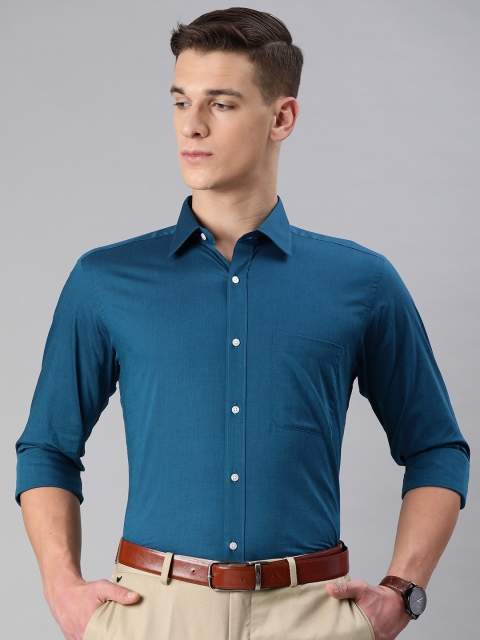 

Raymond Men Blue Slim Fit Solid Formal Shirt