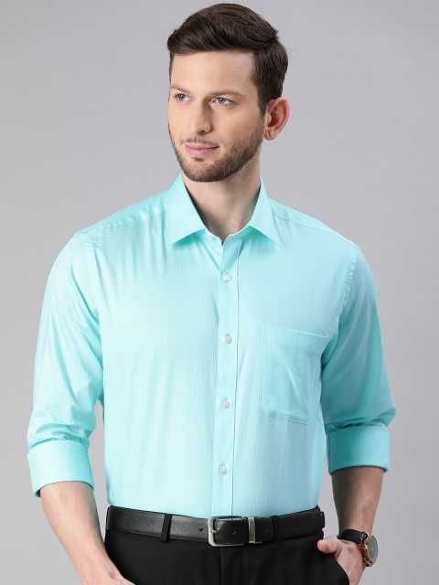 

Raymond Men Blue Slim Fit Self Design Formal Shirt