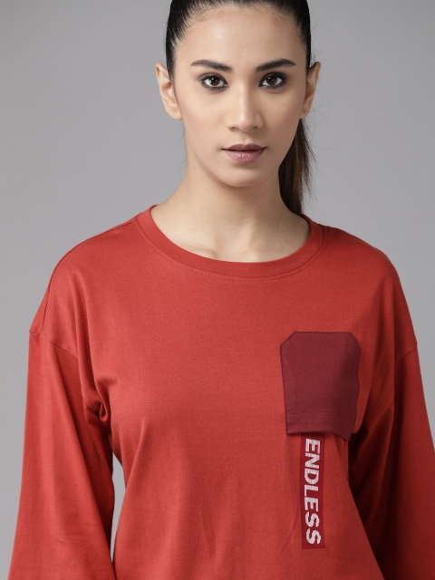 

The Roadster Lifestyle Co Women Rust Red Boxy Pocket Detailing Printed Detail Pure Cotton T-shirt