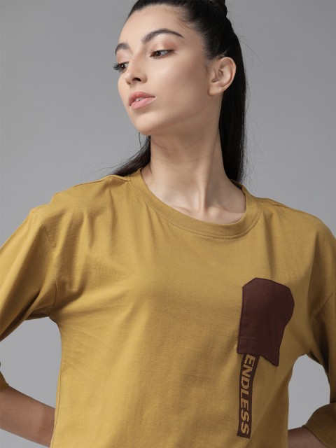 

The Roadster Lifestyle Co Women Khaki Pocket Detailing Solid Round Neck T-shirt