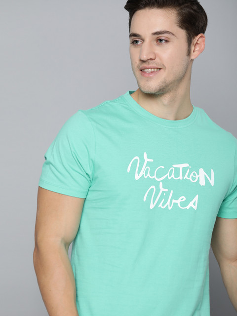 

Mast & Harbour Men Green & White Pure Cotton Printed Round Neck T-shirt