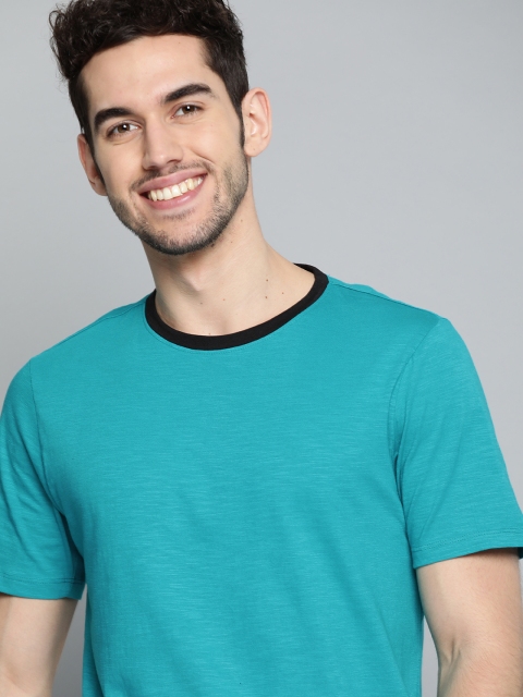 

Mast & Harbour Men Green Pure Cotton Solid Round Neck Handcrafted T-shirt