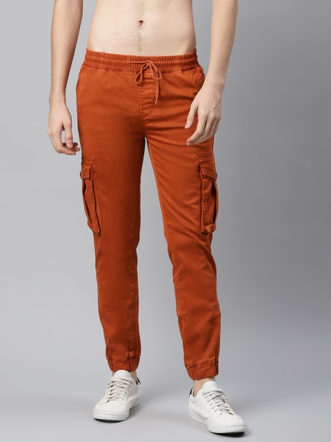 

The Roadster Lifestyle Co Men Rust Brown Solid Cargos Trousers