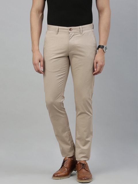 

Louis Philippe Sport Men Beige Slim Fit Solid Regular Trousers