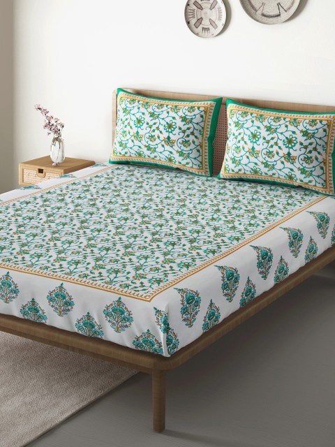

Aura White & Sea Green Ethnic Motifs 104 TC Cotton 110 GSM Queen Bedsheet & Pillow Covers