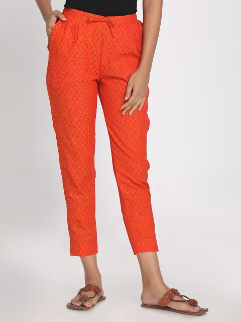 

Nakshi Women Orange Straight Fit Self Design Regular Trousers