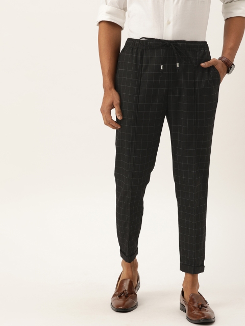 

Peter England Men Black & White Carrot Fit Checked Formal Trousers