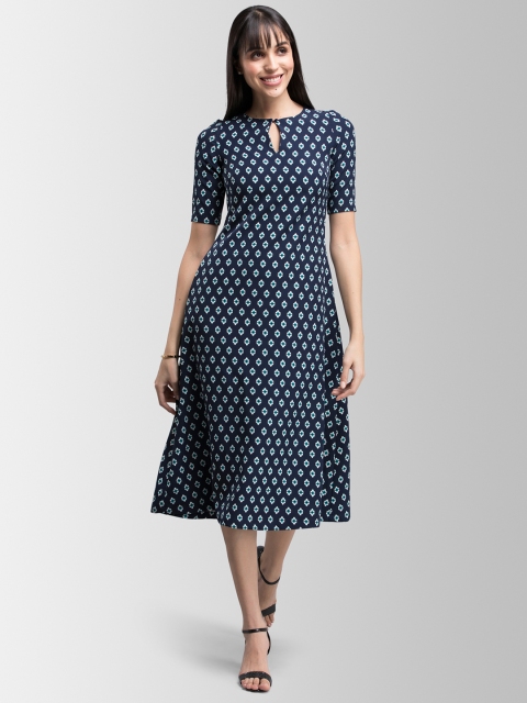 

FableStreet Women Navy Blue Printed Fit and Flare Dress