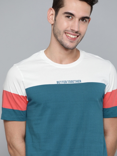 

Mast & Harbour Men Teal Pure Cotton Colourblocked Round Neck T-shirt