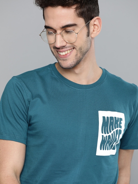 

Mast & Harbour Men Teal Blue & White Typography Print Pure Cotton Round Neck T-shirt