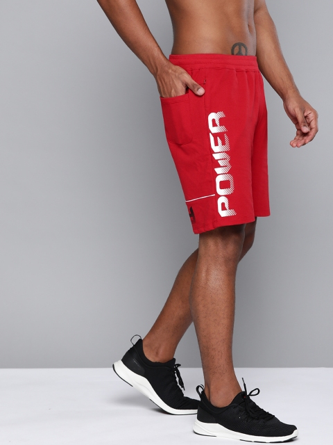 

HRX By Hrithik Roshan Men Barbados Cherry Typographic Regular Fit Mid-Rise Bio-Wash Lifestyle Shorts, Red