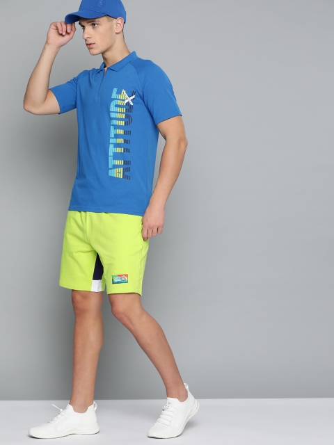 

HRX By Hrithik Roshan Men Wild Lime Colourblock Regular Fit Mid-Rise Bio-Wash Lifestyle Shorts, Fluorescent green