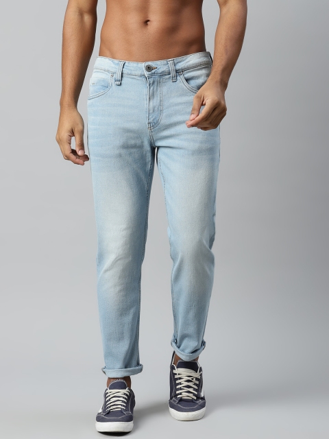 

The Roadster Lifestyle Co Men Blue Tapered Fit Heavy Fade Stretchable Jeans