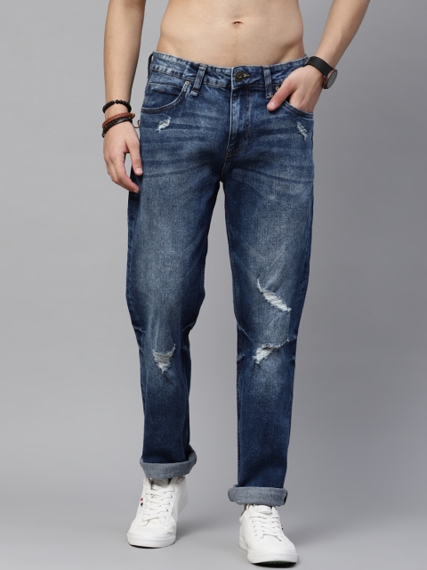 

The Roadster Lifestyle Co Men Blue Slim Tapered Fit Mildly Distressed Light Fade Stretchable Jeans