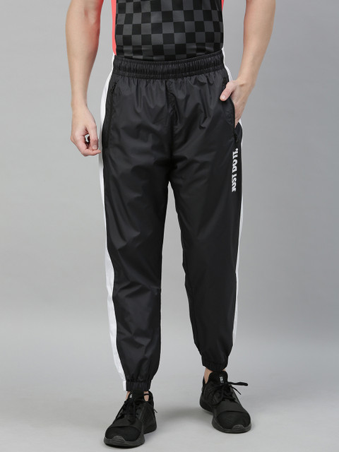 

Nike Men's Black Solid Track Pants with Side Stripes