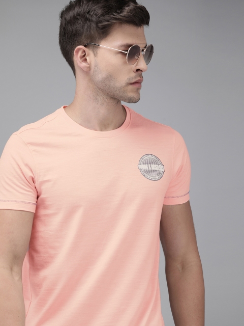 

SPYKAR Men Peach-Coloured Solid Round Neck T-shirt With Printed Detailing