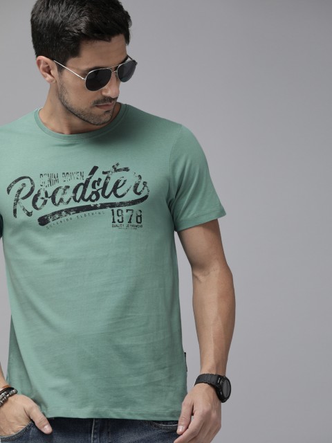 

The Roadster Lifestyle Co Men Mint Green Black Brand Logo Print Round Neck Pure Cotton T-shirt