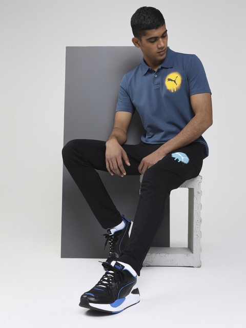 

Puma Men Blue Solid Polo Collar T-shirt