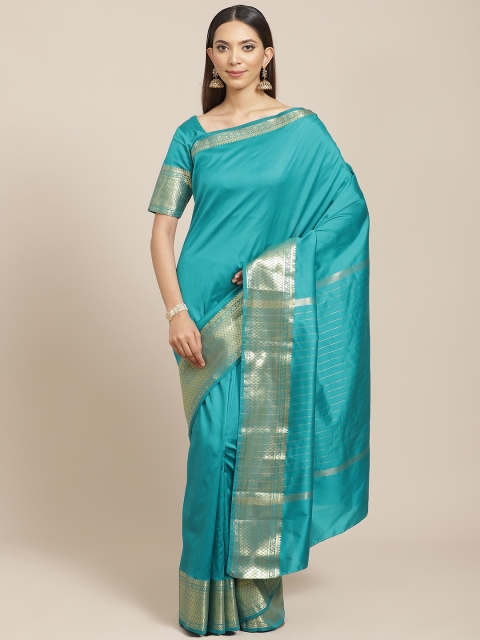 

Libas Teal Blue & Golden Solid Saree