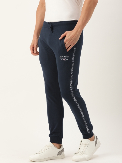 

The Indian Garage Co Men Navy Blue Solid Joggers with Side Printed Detail