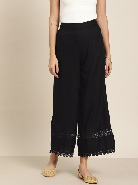 

Moda Rapido Women Black Solid Wide Leg Cropped Palazzos with Embroidered Detail