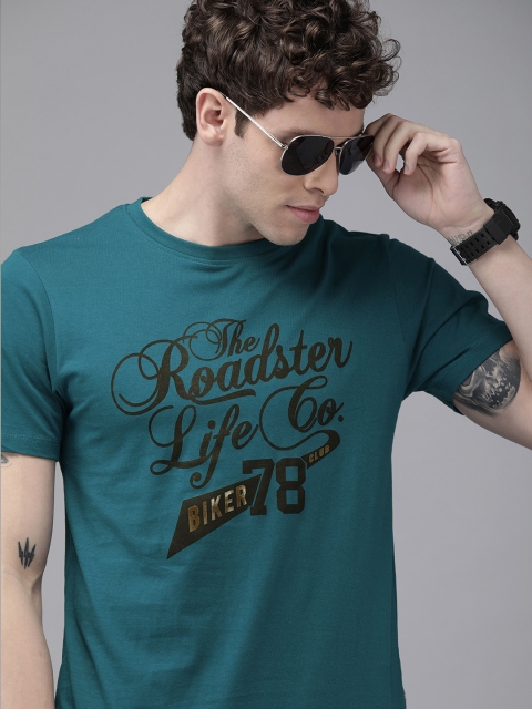 

The Roadster Lifestyle Co Men Teal Blue Brand Logo Printed Round Neck Pure Cotton T-shirt