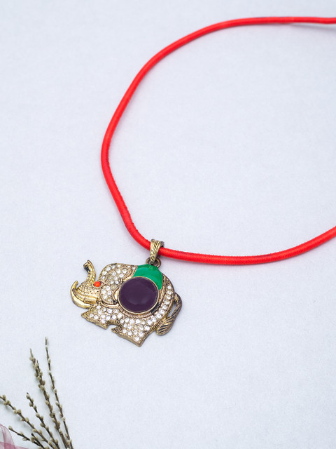 

Golden Peacock Gold-Toned & Red Stone-Studded Elephant Shaped Pendant with Nylon Cord