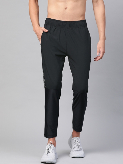 

HRX By Hrithik Roshan Men Anthracite Solid Hybrird Mid-Rise Rapid-Dry Training Track Pants, Black