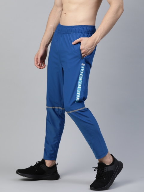 

HRX By Hrithik Roshan Men Mazarine Blue Typographic Hybrird Rapid-Dry Training Track Pants