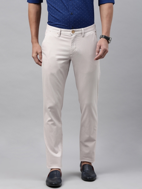 

Louis Philippe Sport Men Beige Solid Slim Fit Regular Trousers