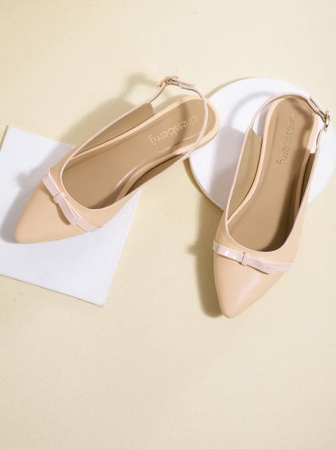 

DressBerry Women Peach-Coloured Solid Mules with Bow Detail