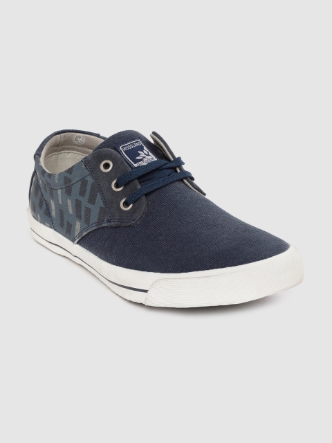 

Woodland Men Navy Blue Solid Sneakers with Geometric Print Detail