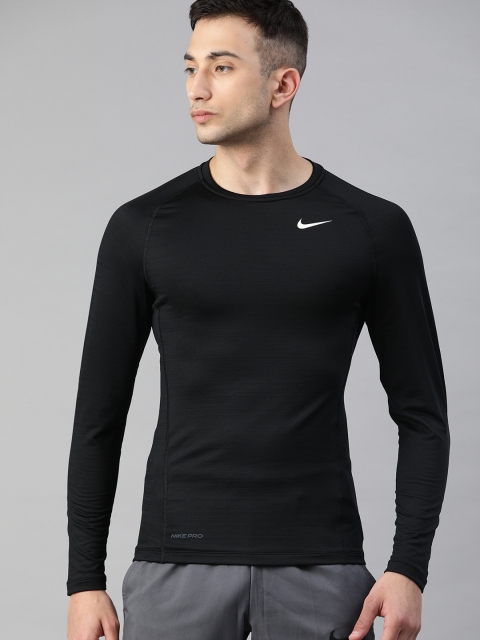 

Nike Men Black Solid NP TOP WARM Round Neck T-shirt