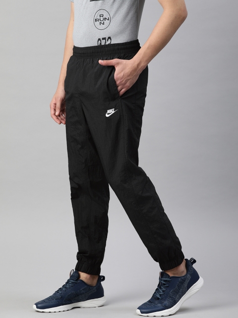 

Nike Men Black Straight Fit Solid NSW CE PANT CF WVN Joggers