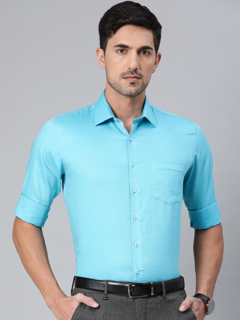 

Van Heusen Men Blue Slim Fit Solid Formal Shirt