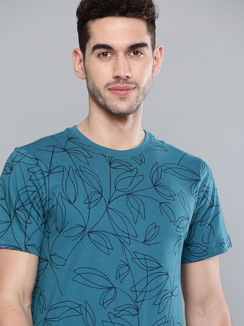 

Mast & Harbour Men Teal Blue & Black Printed Pure Cotton Round Neck T-shirt