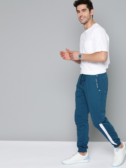 

Mast & Harbour Men Teal Blue Solid Cotton Joggers