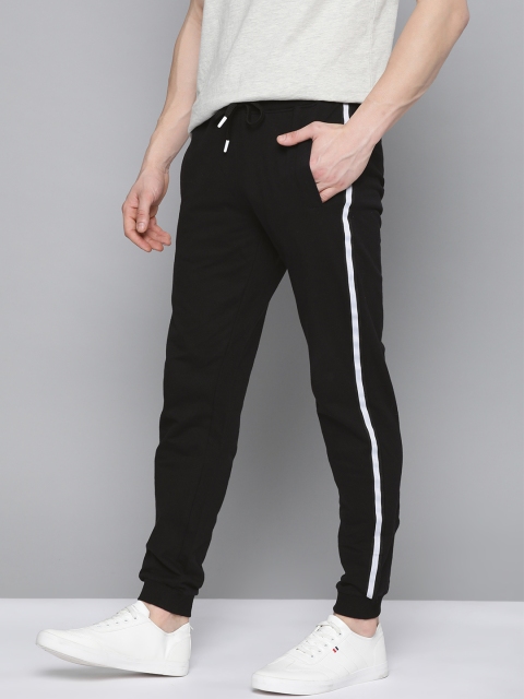 

Mast & Harbour Men Black Pure Cotton Solid Joggers With Stripe Taping