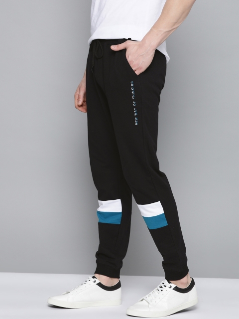 

Mast & Harbour Men Black Solid Pure Cotton Solid Joggers
